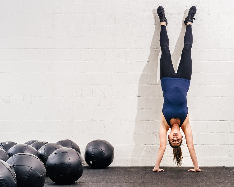 Handstands strengthen your core and upper body muscles